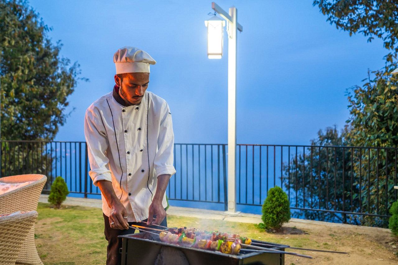 Grilling on the lawn at dusk