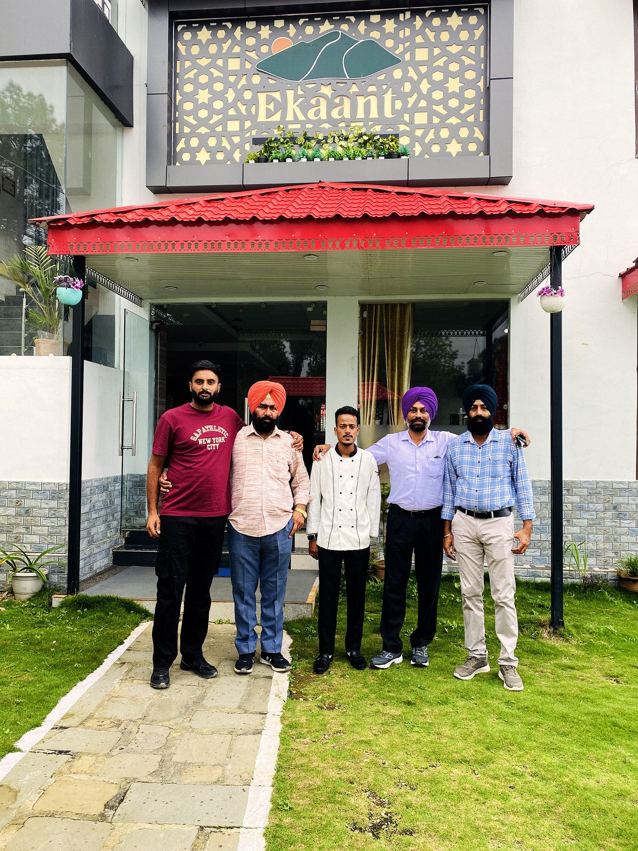 Guests outside the house after their stay